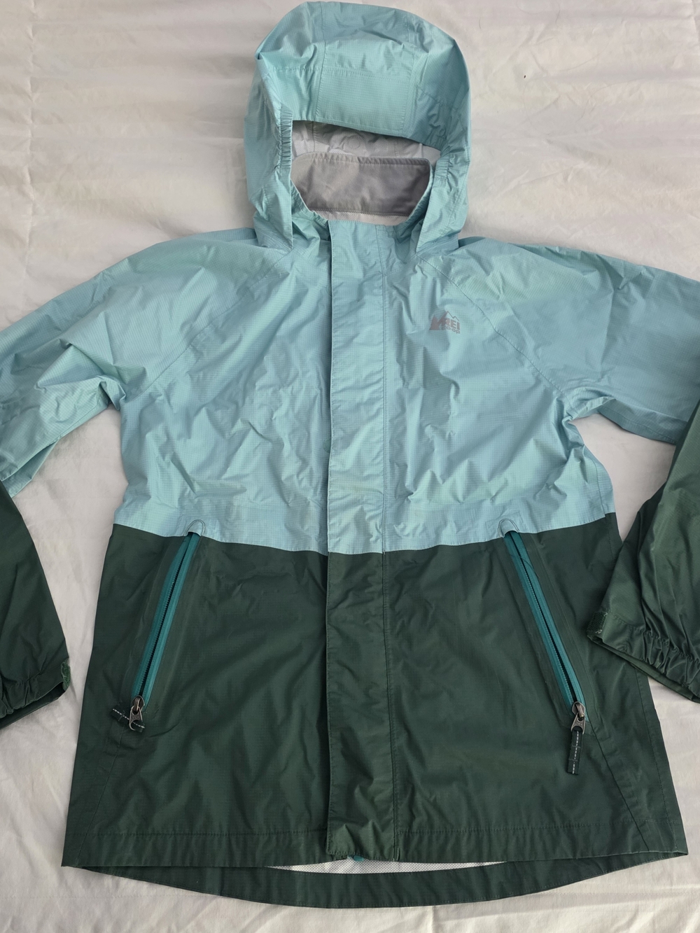REI Two-Tone Light Teal and Dark Green Kids Rain Jacket